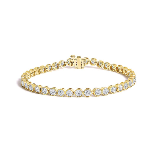 Close-up front angle of a yellow bracelet featuring round white gemstones in bezel settings along its entire length, shown partially open on a white background.