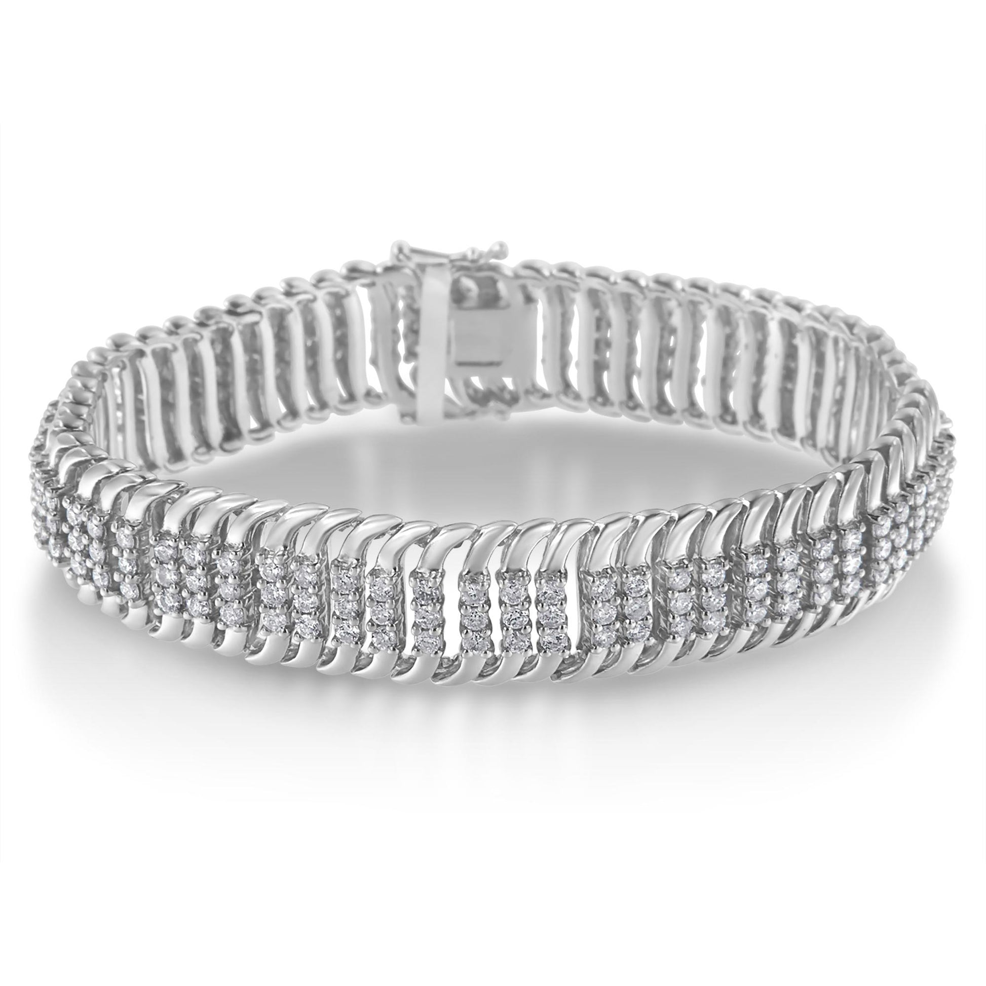 White metal bracelet with multiple rows of round white gemstones in prong settings, shown from a front angle.