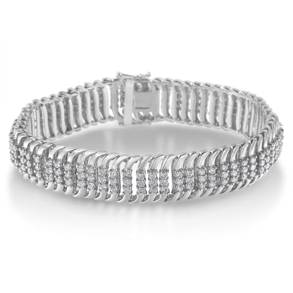 White metal bracelet with multiple rows of round white gemstones in prong settings, shown from a front angle.