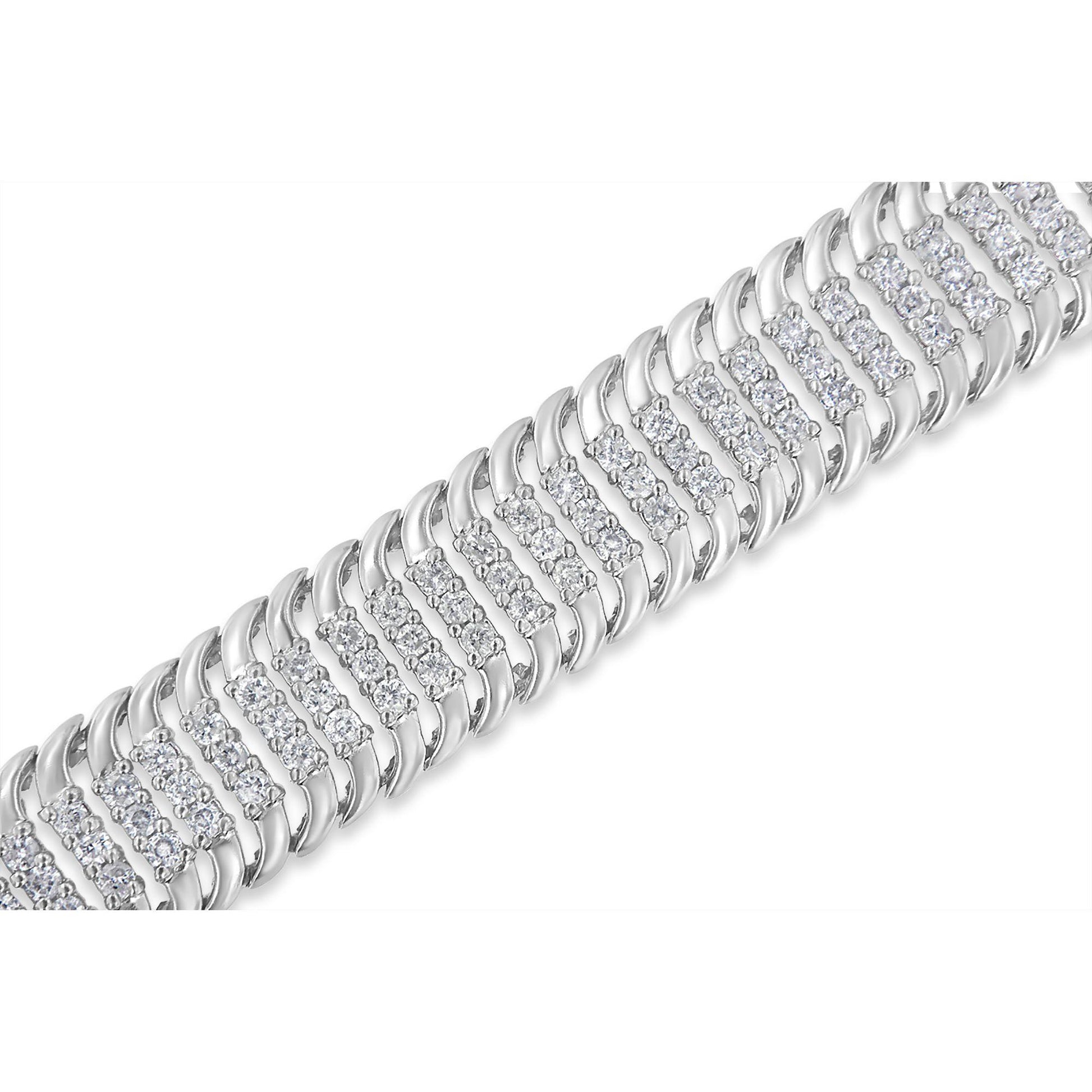 Close-up angled view of a white metal bracelet featuring alternating curved links and rows of round white gemstones in prong settings.