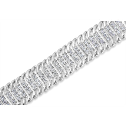 Close-up angled view of a white metal bracelet featuring alternating curved links and rows of round white gemstones in prong settings.