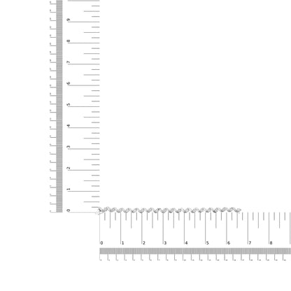 White metal bracelet with alternating round prong-set and baguette channel-set white gemstones, displayed on a ruler for size reference, shot from above.
