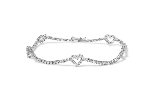 White metal bracelet with round white gemstones in prong settings and heart-shaped accents, shown flat from a front angle.