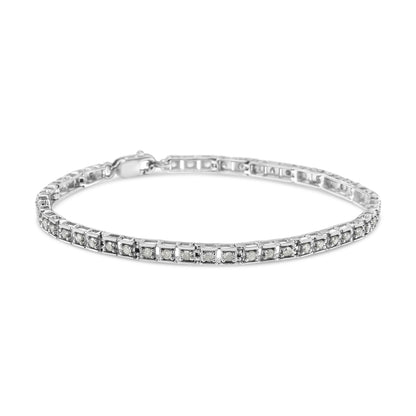 White metal bracelet with round white gemstones in prong settings, shown from a slightly angled top view on a white background.