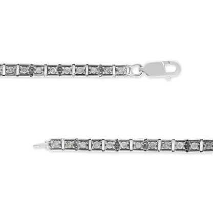 White metal bracelet with round white gemstones in prong settings, shown in a flat lay from a top-down angle.