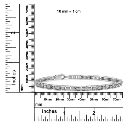 White metal bracelet with round white gemstones in prong settings, displayed flat on a ruler for size reference, shot from a front angle.