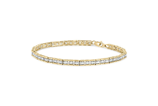 Yellow metal bracelet with round white gemstones in pave setting, shown in a front angled view on a white background.