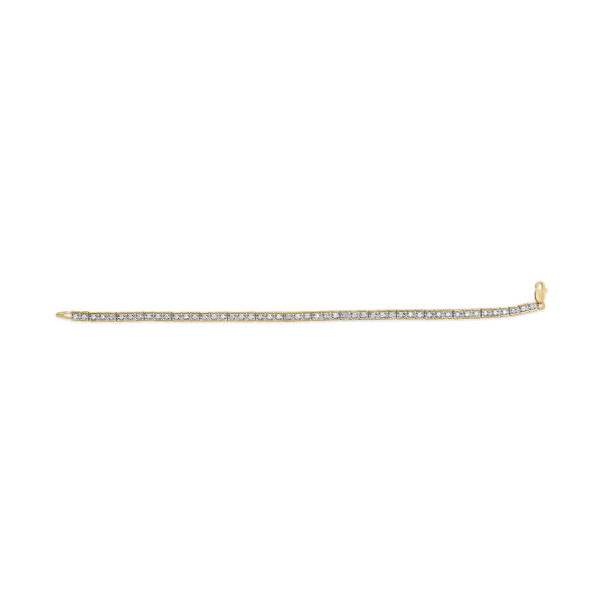 Yellow metal bracelet with a row of white round gemstones in pave setting, shown from a top flat angle on a white background.