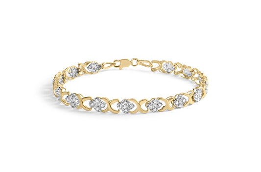 Yellow bracelet with round white gemstones in prong settings, shown from a front angled view on a white background.