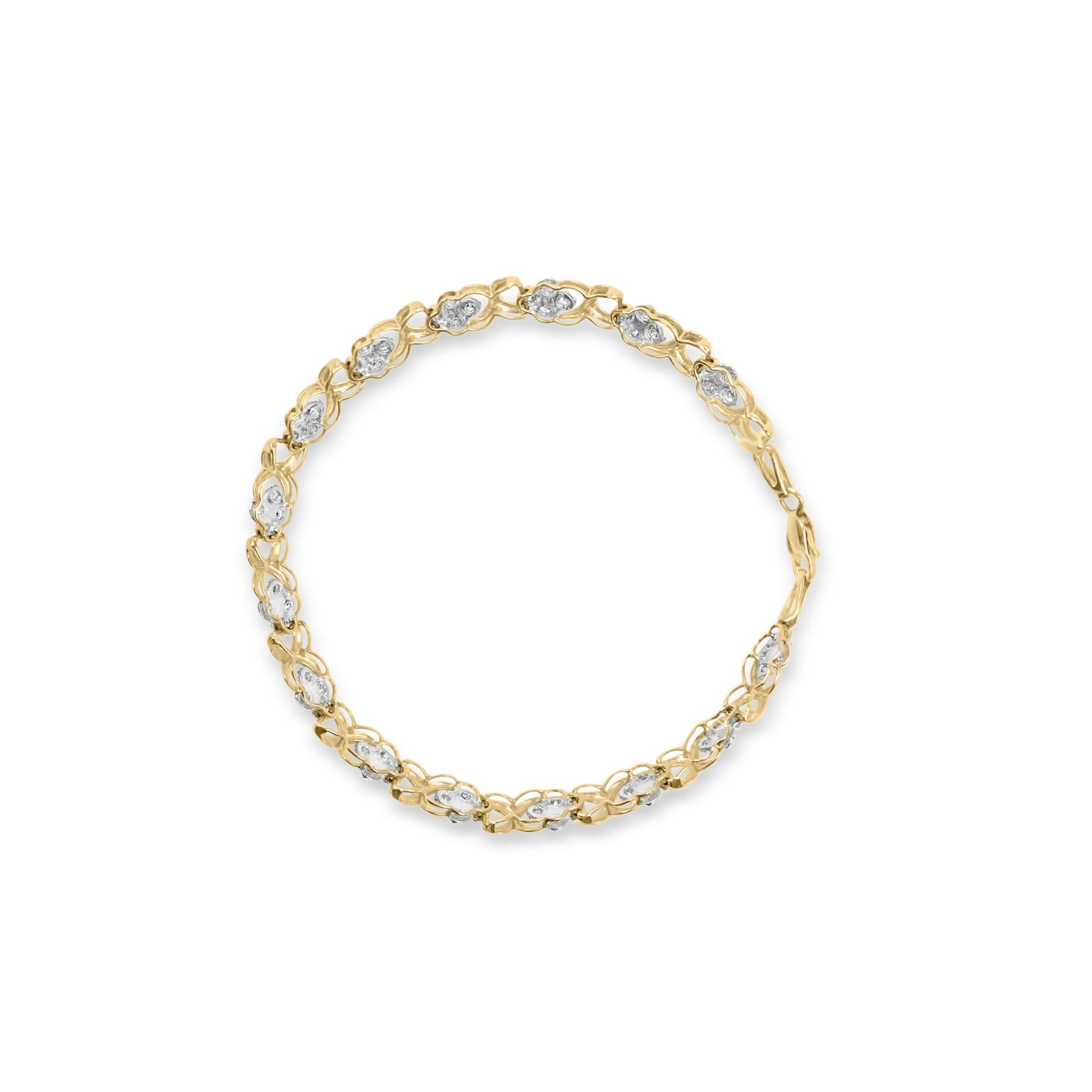 Top-down view of a yellow metal bracelet with round white gemstones in prong settings forming a continuous pattern.