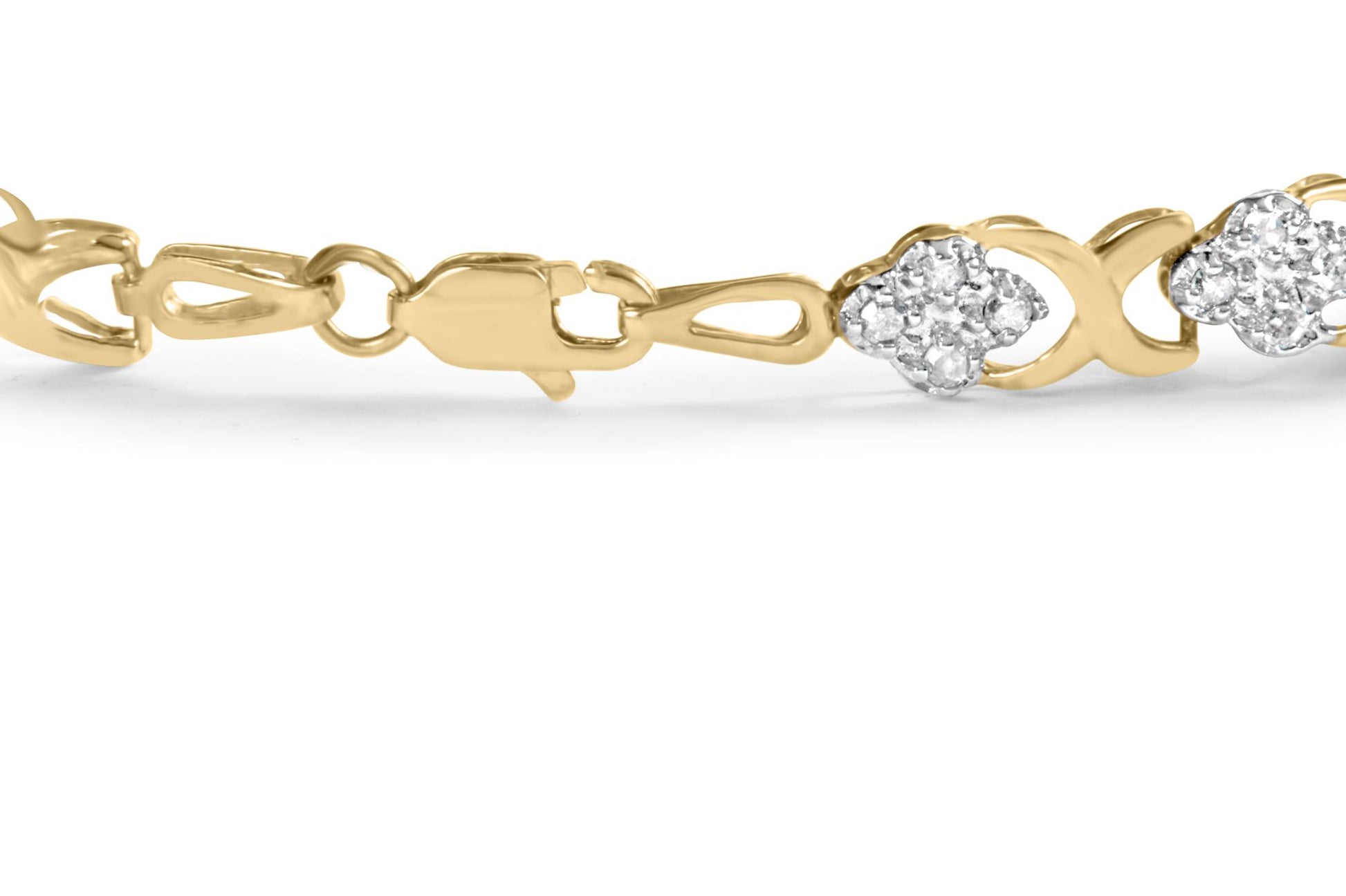 Close-up side angle view of a yellow metal bracelet featuring multiple clusters of round white gemstones set in prongs with an interlocking link design.