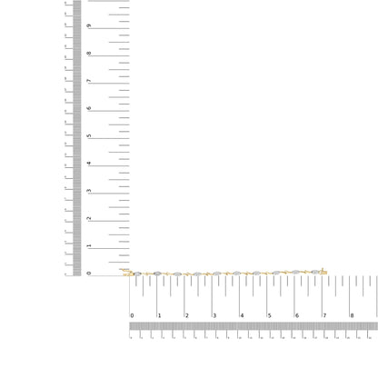 Bracelet with alternating yellow and white metal links featuring white round gemstones in prong settings, laid flat and positioned diagonally on a ruler for size reference.
