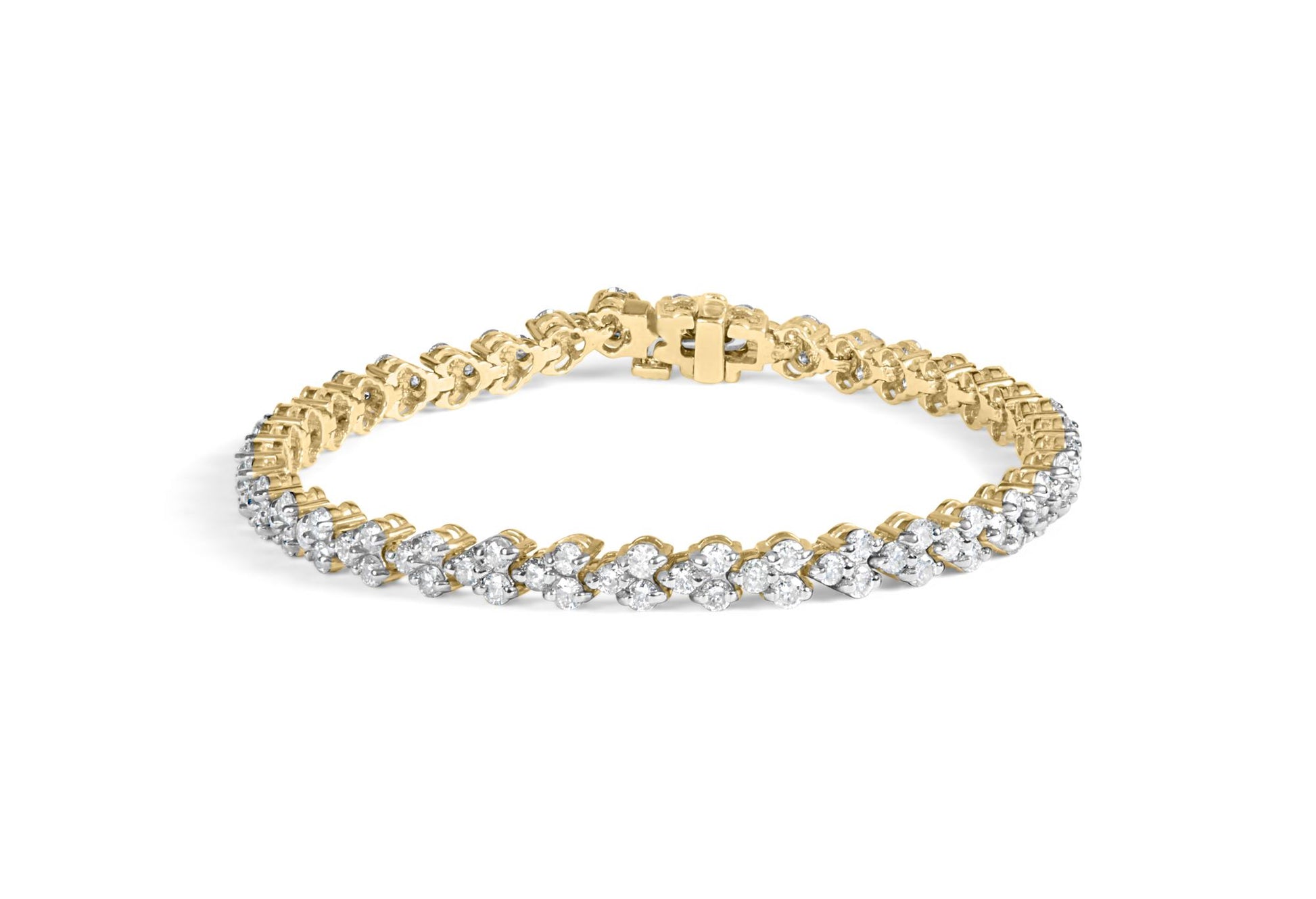 Yellow metal bracelet with prong-set round white gemstones, shown from a slightly angled top view.