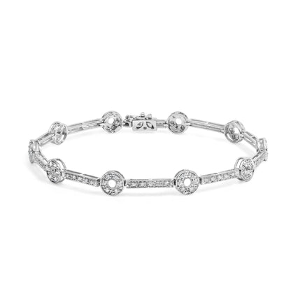 White metal bracelet with alternating circular and rectangular links, each adorned with multiple small white gemstones, shown from a front angle.