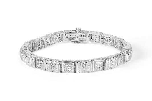 White metal bracelet with alternating square links featuring round pave set white gemstones and sections with baguette channel set white gemstones, shown in a front angled view on a white background.