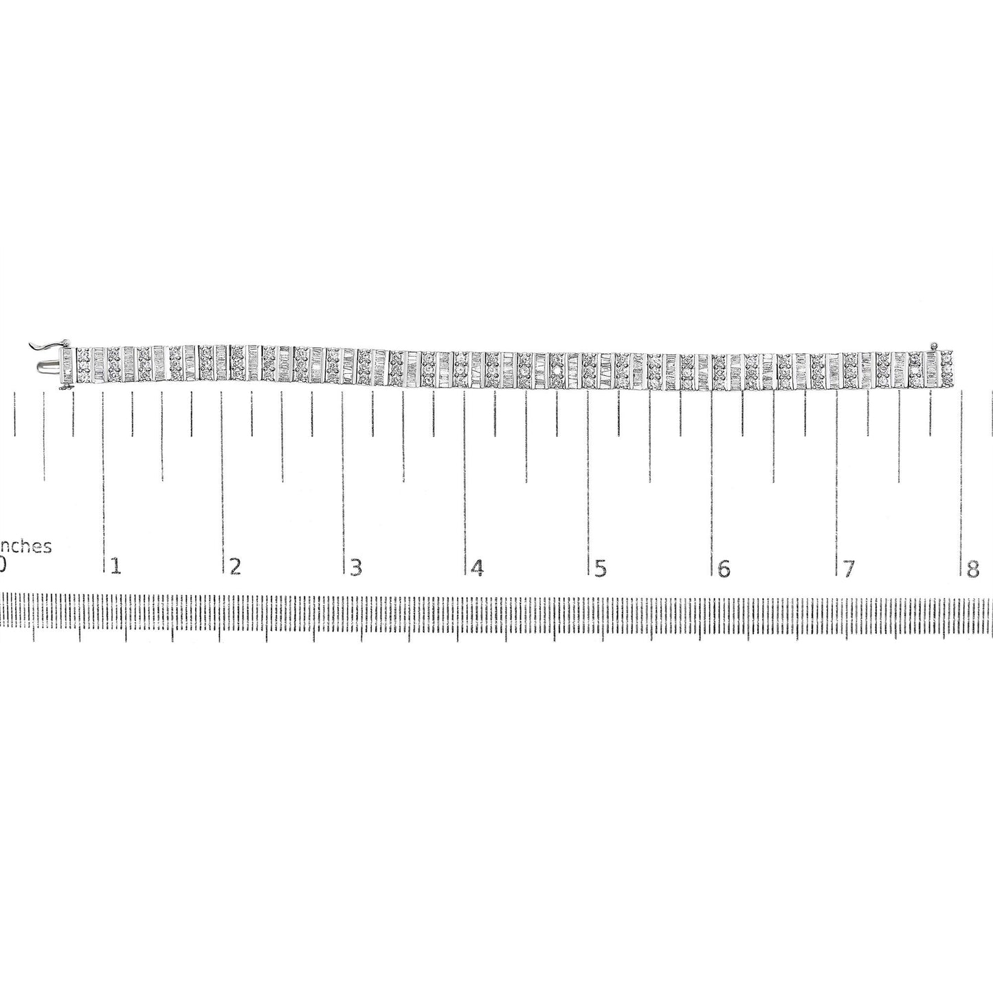 White metal bracelet with alternating rows of round prong-set and baguette channel-set white gemstones, laid flat on a ruler for size reference, shot from above.