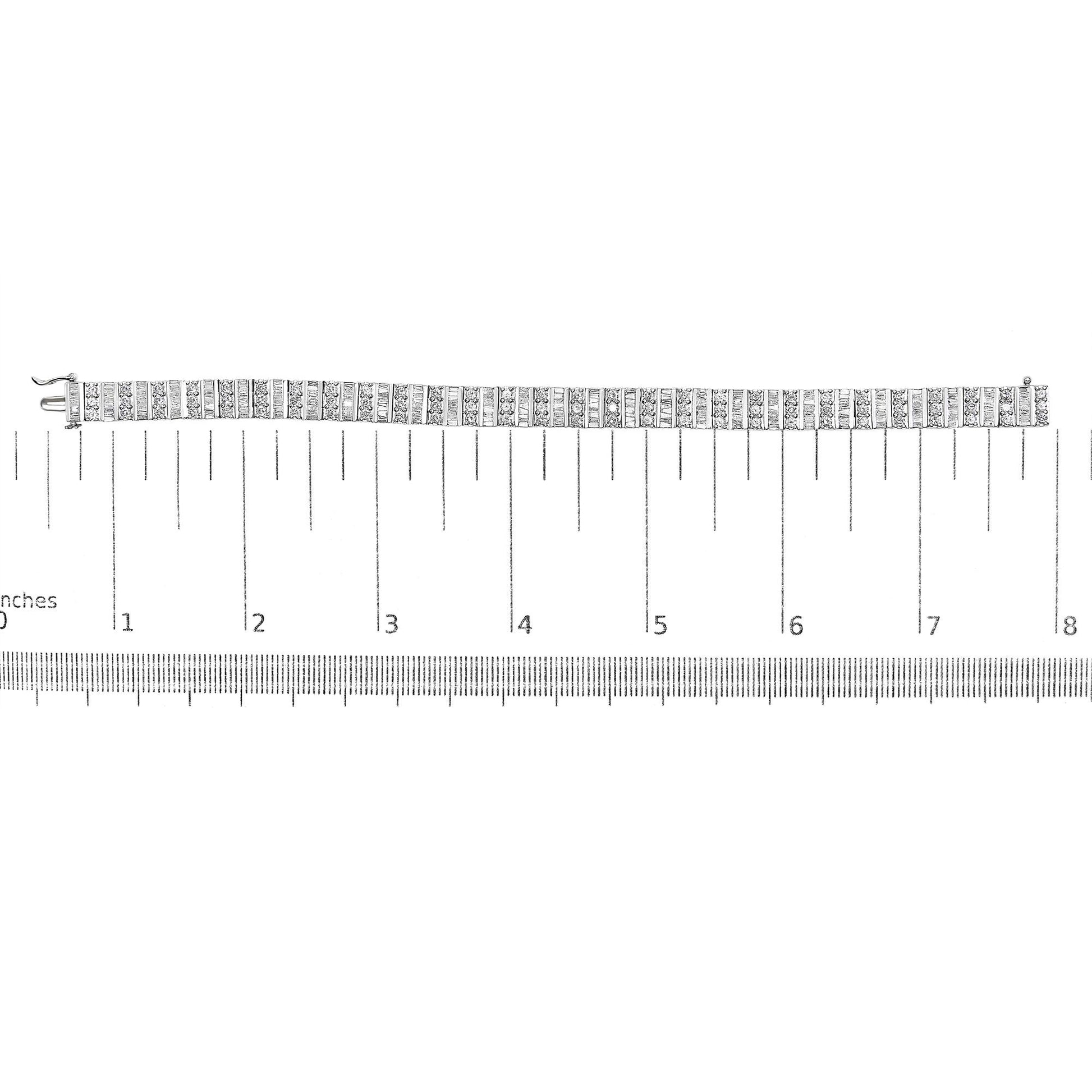 White metal bracelet with alternating rows of round prong-set and baguette channel-set white gemstones, laid flat on a ruler for size reference, shot from above.