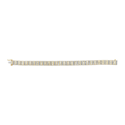 Straight-on top view of a yellow bracelet featuring alternating rows of round prong-set white gemstones and baguette channel-set white gemstones.