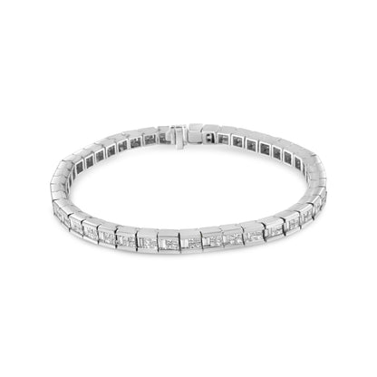 White metal bracelet with alternating princess and baguette shaped white gemstones in channel settings, shown from a slightly elevated front angle.