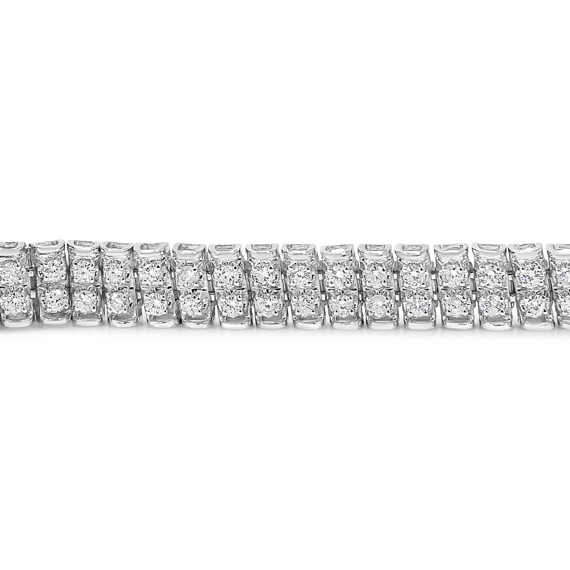 Close-up front view of a white metal bracelet with multiple round white gemstones set in prong settings.