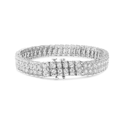 White metal bracelet with multiple rows of round white gemstones in prong settings, shown from a front angle on a white background.