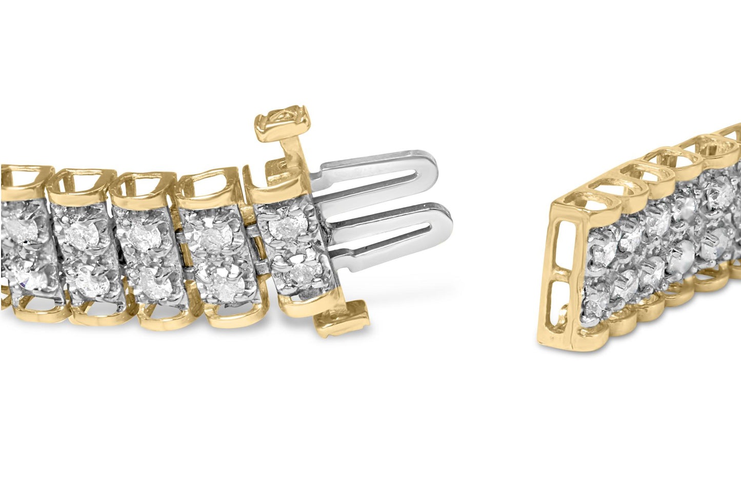 Close-up angle of a yellow metal bracelet with two rows of white round gemstones set in prongs, showing the clasp mechanism.