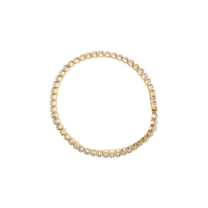 Top-down view of a yellow metal bracelet featuring round white gemstones in prong settings linked together in a continuous circle.