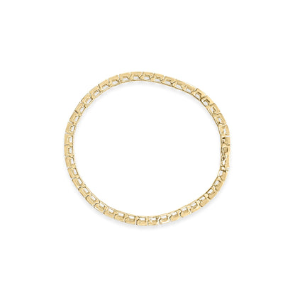 Top-down view of a yellow metal bracelet with square links, each set with round white gemstones in prong settings.