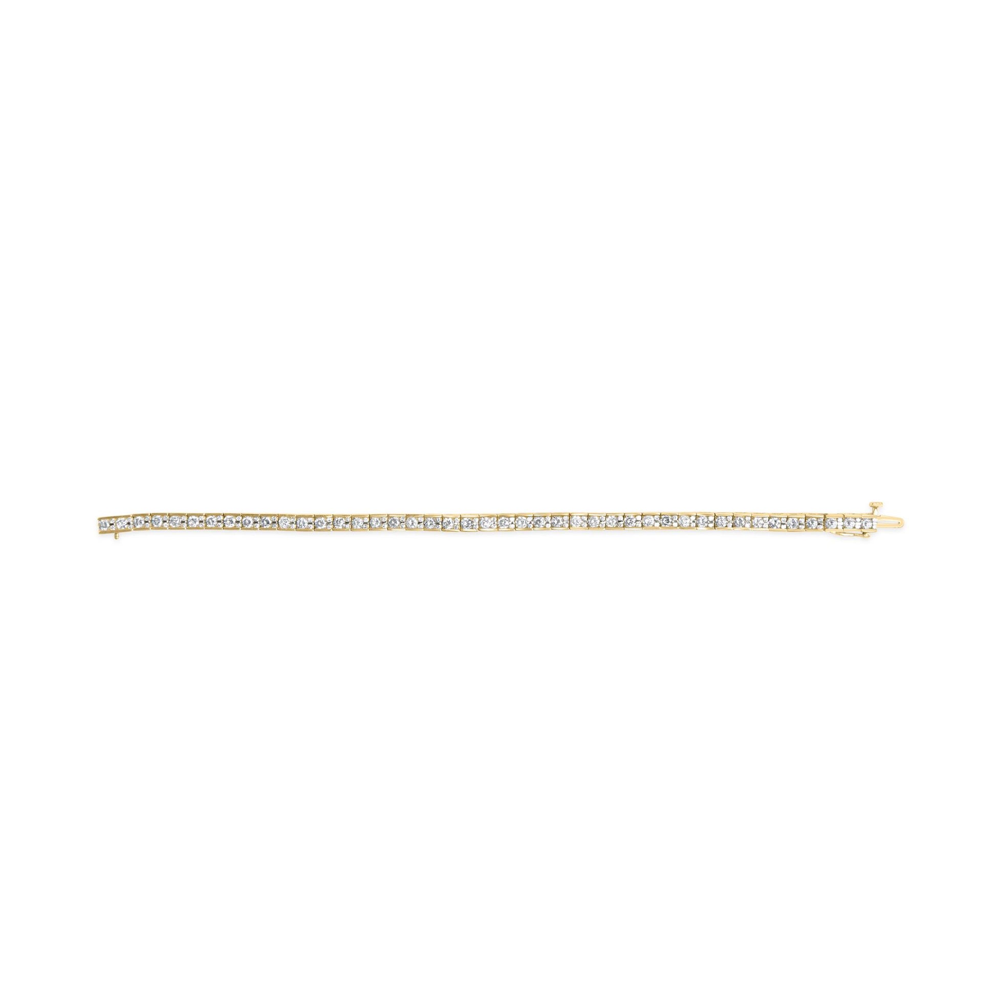 Yellow metal bracelet with white round gemstones in prong settings, shown in a flat lay from a top-down angle.