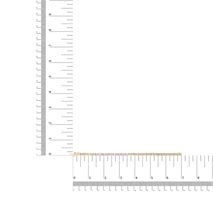Yellow metal bracelet with round white gemstones in prong settings, shown flat on a ruler for size reference, top-down angle.