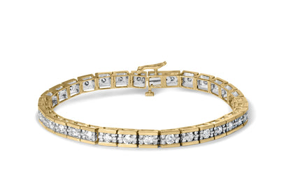 Yellow metal bracelet with two rows of channel set round white gemstones, shown from a front angle.