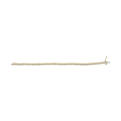 Yellow metal bracelet shown from a top-down angle with round white gemstones in 2-prong settings alternating with baguette white gemstones in channel settings.