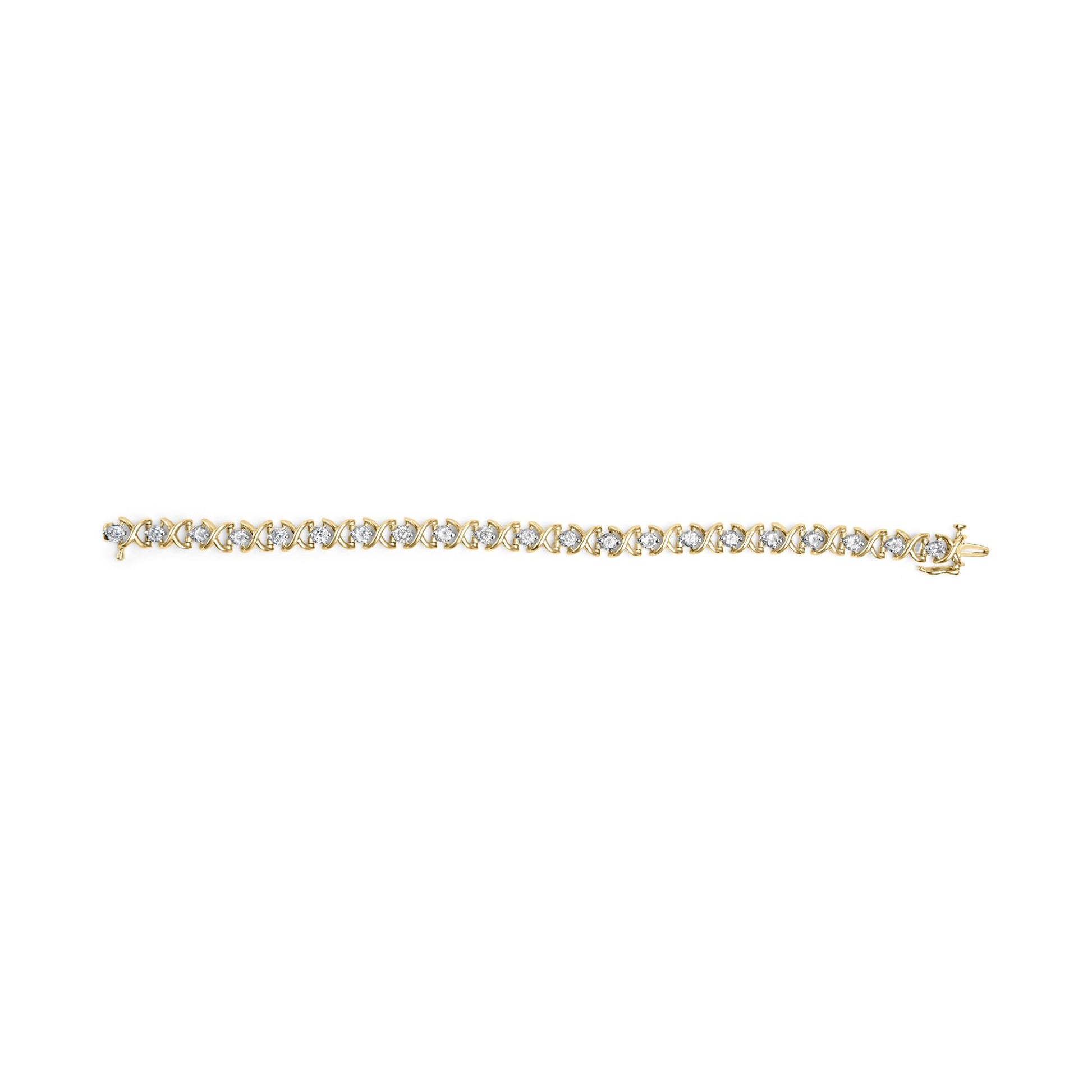 Top-down view of a yellow metal bracelet featuring round white gemstones in prong settings alternated with crossed metal links.