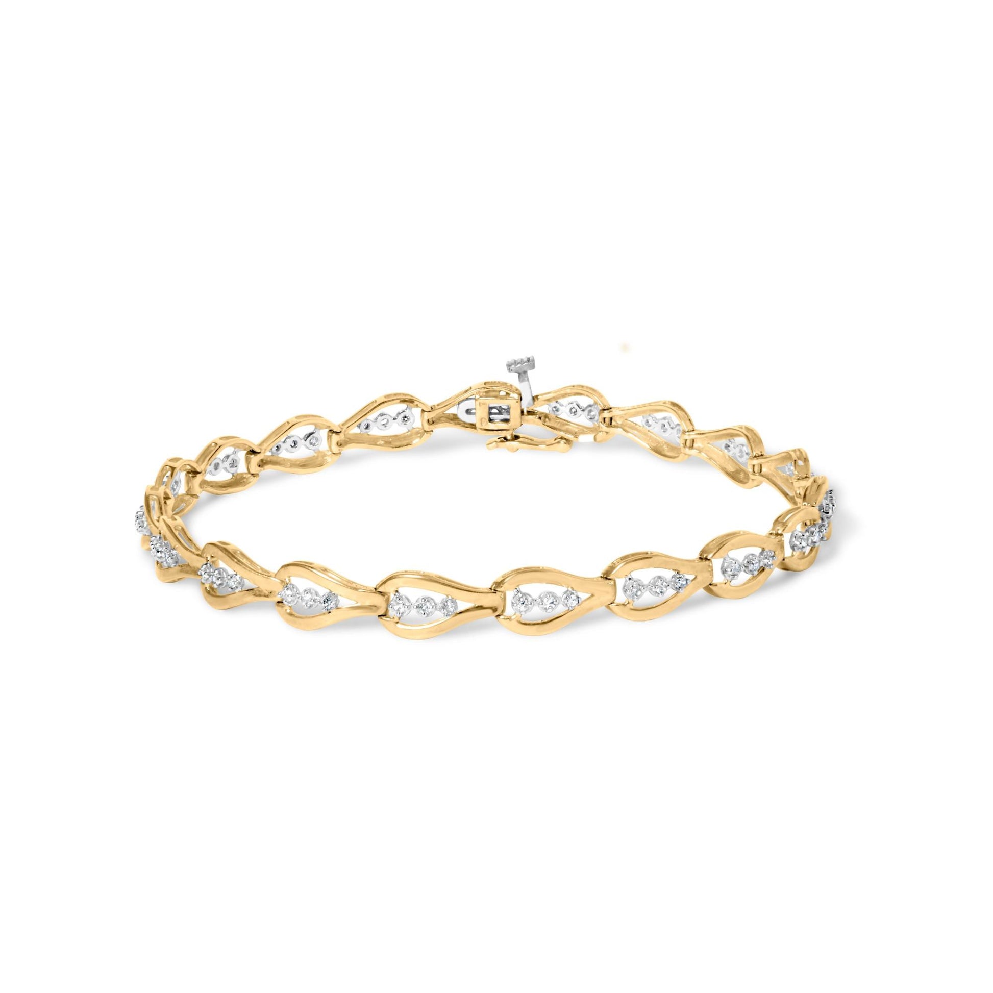 Yellow metal bracelet with alternating openwork links featuring clusters of white round gemstones in prong settings, shown from a slight top angle.