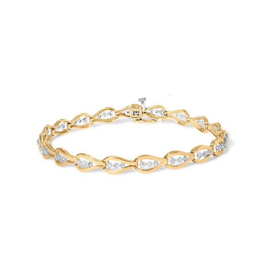 Yellow metal bracelet with alternating openwork links featuring clusters of white round gemstones in prong settings, shown from a slight top angle.