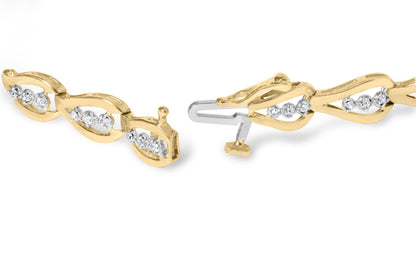 Close-up front angle of a yellow metal bracelet with linked leaf-shaped designs, each set with clusters of white round gemstones in prong settings, showing the clasp open.