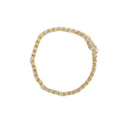 Yellow bracelet with round white gemstones in a miracle setting, shown flat from a top-down angle.
