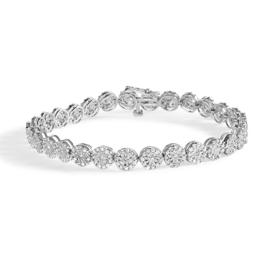 White metal bracelet with round pave-set white gemstones in circular settings, shown in a front angled view.