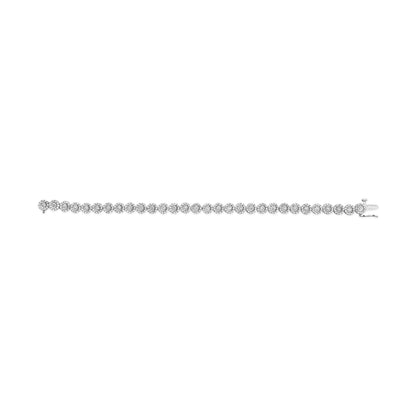 White metal bracelet with round white gemstones in a pave setting, side view on a white background.