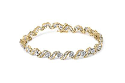 Yellow metal bracelet with alternating round prong-set and baguette channel-set white gemstones, shown in a flat angled view.