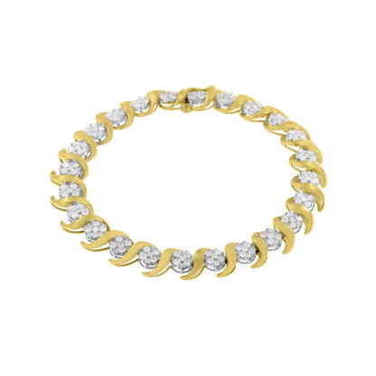 Top-down angle of a yellow metal bracelet featuring alternating curved links and round white gemstones in prong settings.
