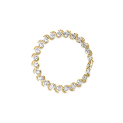 Top-down view of a yellow bracelet featuring alternating round white gemstones in a prong setting.
