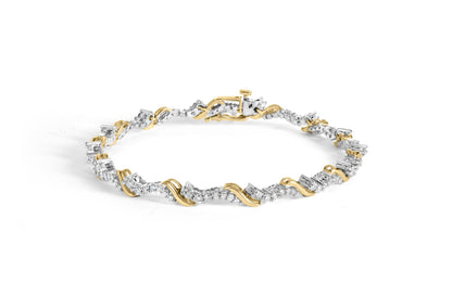 Bracelet with alternating yellow and white metal twisted design and prong-set round white gemstones, shown from a slight side angle on a white background.