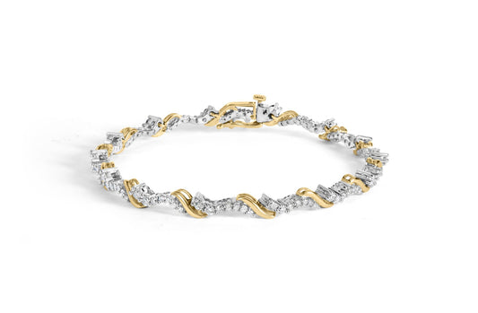 Bracelet with alternating yellow and white metal twisted design and prong-set round white gemstones, shown from a slight side angle on a white background.