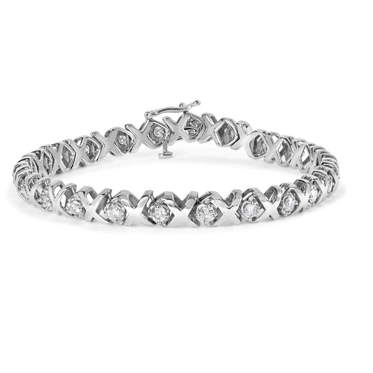 White metal bracelet with round white gemstones in prong settings arranged in an alternating X and gemstone pattern, front angle view.