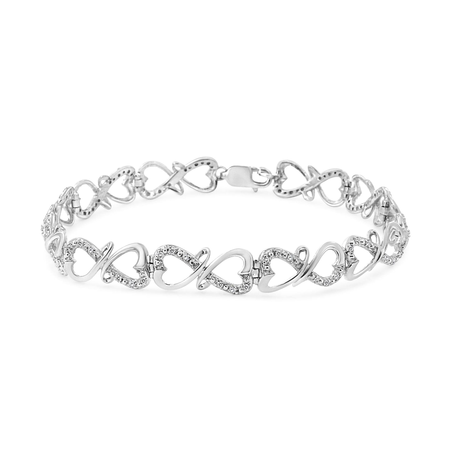 White metal bracelet with alternating heart shapes, some adorned with white round gemstones in prong settings, shown from a front angle.