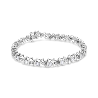 White metal bracelet with alternating round white gemstones and white gemstones in prong settings, shown from a front angle on a white background.