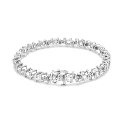 Front angled view of a white metal bracelet featuring alternating round white gemstones and white gemstones in prong settings.