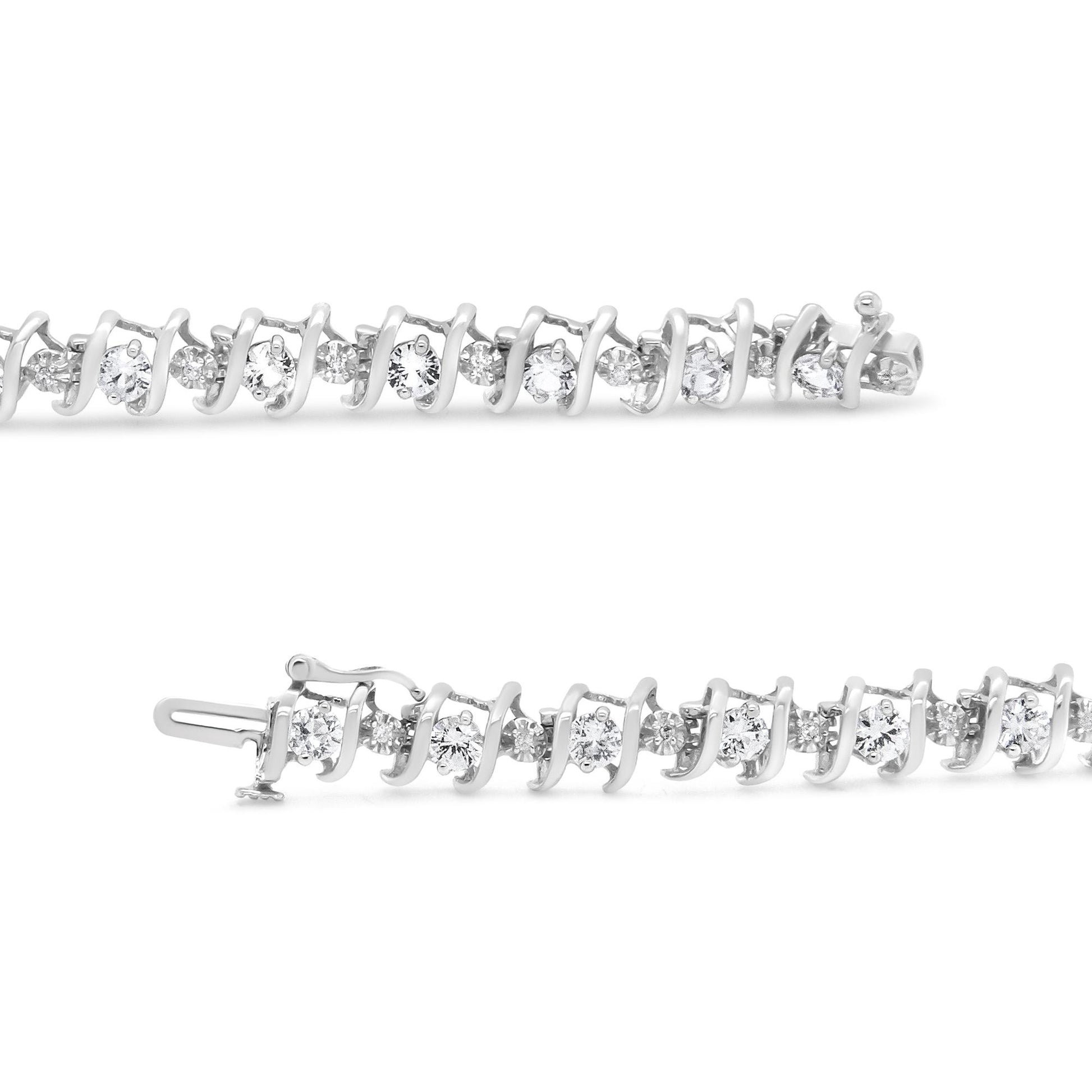 Close-up side view of a white metal bracelet featuring alternating round white gemstones and red gemstones in prong settings, laid flat on a white background.