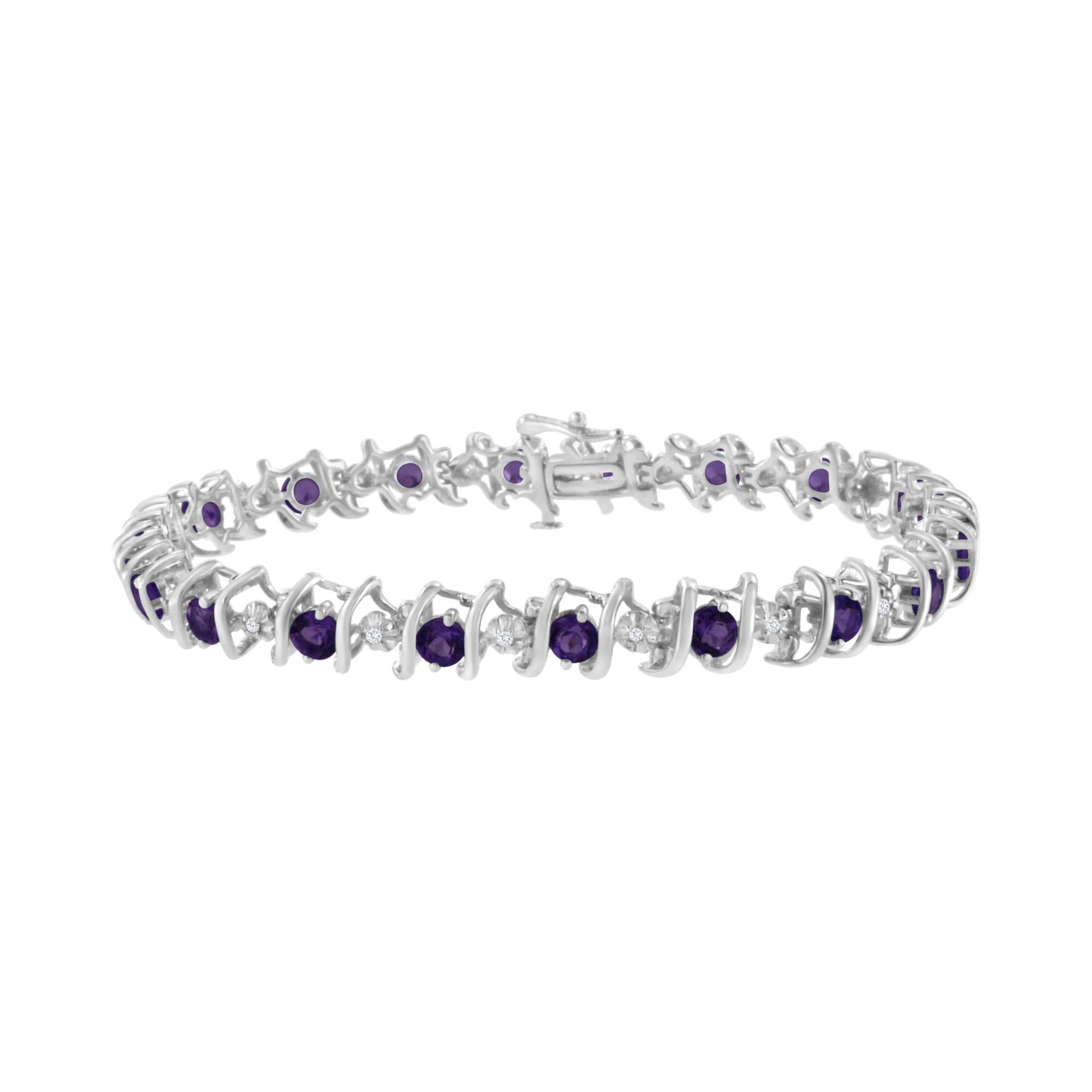 White metal bracelet with alternating round purple and white gemstones in prong settings, shown in a front angle view.